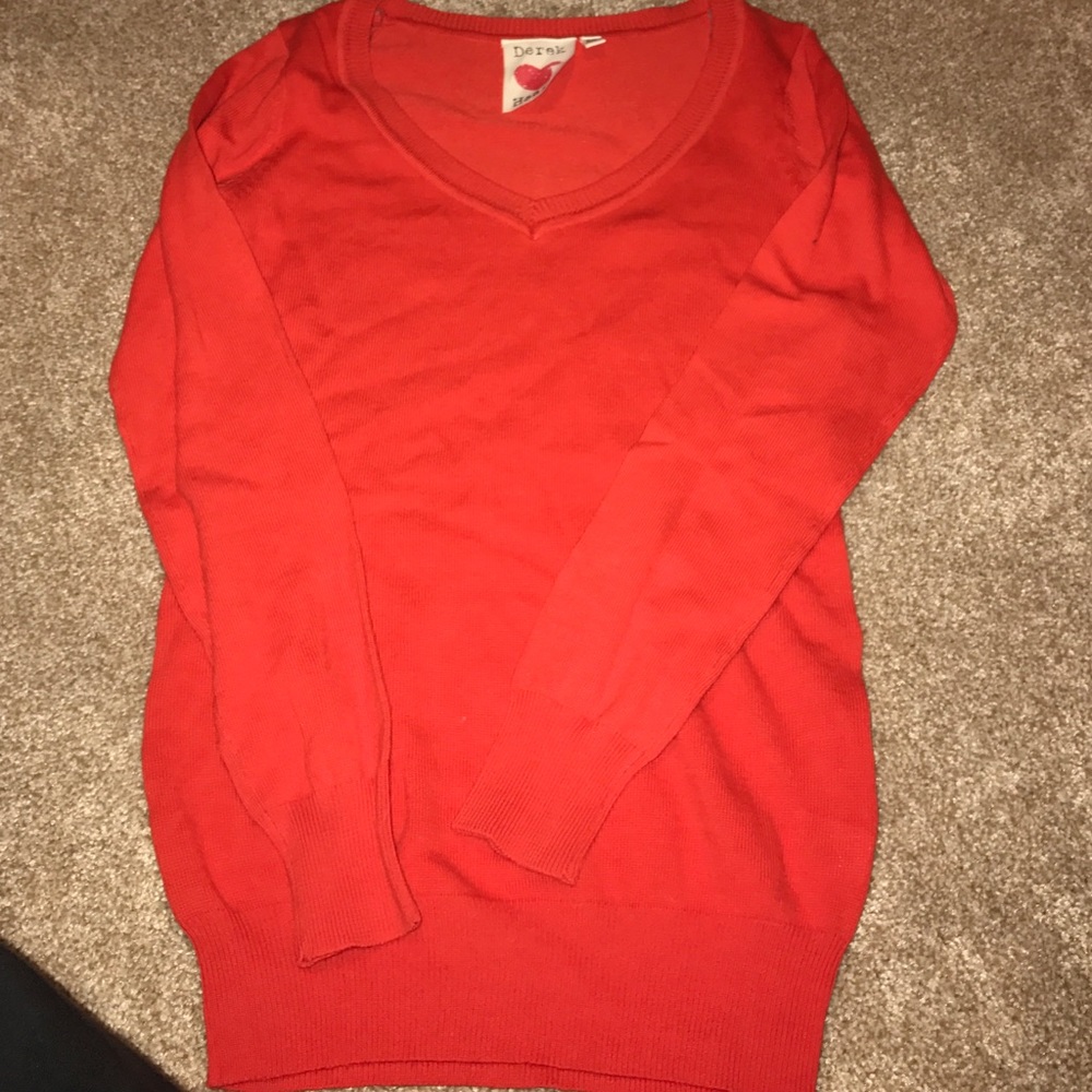 Derek heart red/orange V neck sweater.