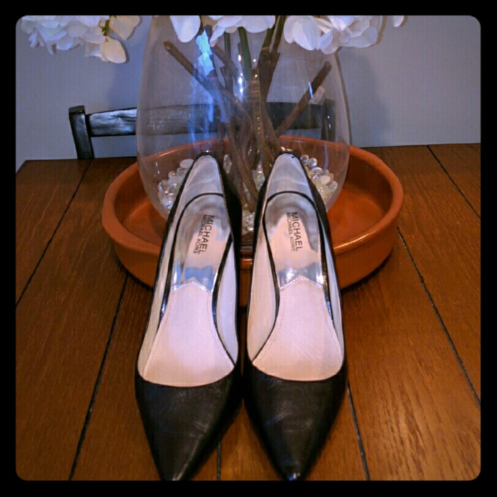Black leather pumps