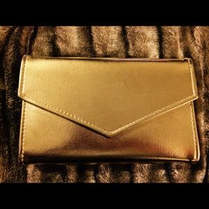 Small gold clutch/mini bag