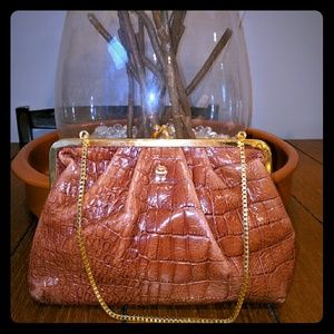 Small crocodile embossed leather clutch