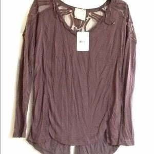 Free People shirt. Size small. New with tags.