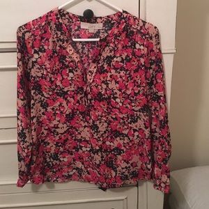 Floral print button down blouse.