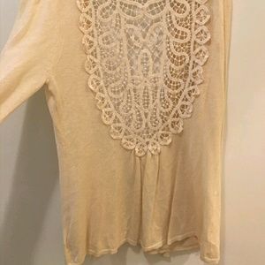 Cream colored cardigan with crochet back