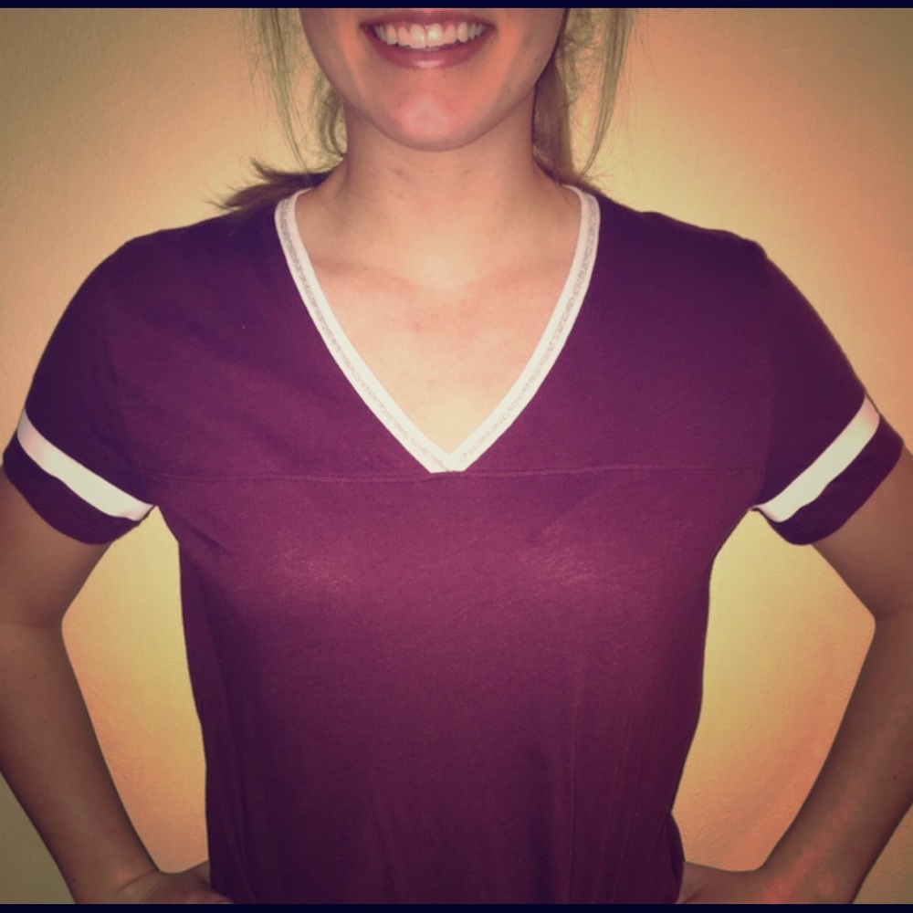 Maroon Victoria's Secret shirt and white jacket