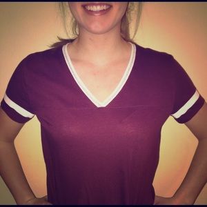 Maroon Victoria's Secret shirt and white jacket