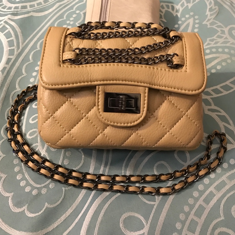 Cute cream purse! From NYC boutique.  Used once!