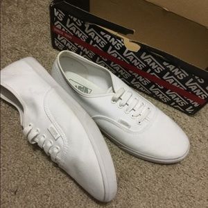 White Vans. Size men's 7.5, women's 9's.