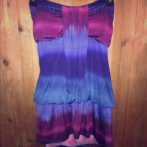 Beautiful blouse/dress can be worn with leggings.