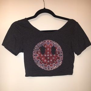 Crop top with smiley face.