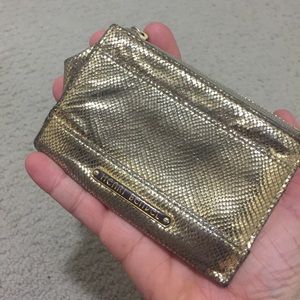 Henri Bendle gold ID holder. final price.