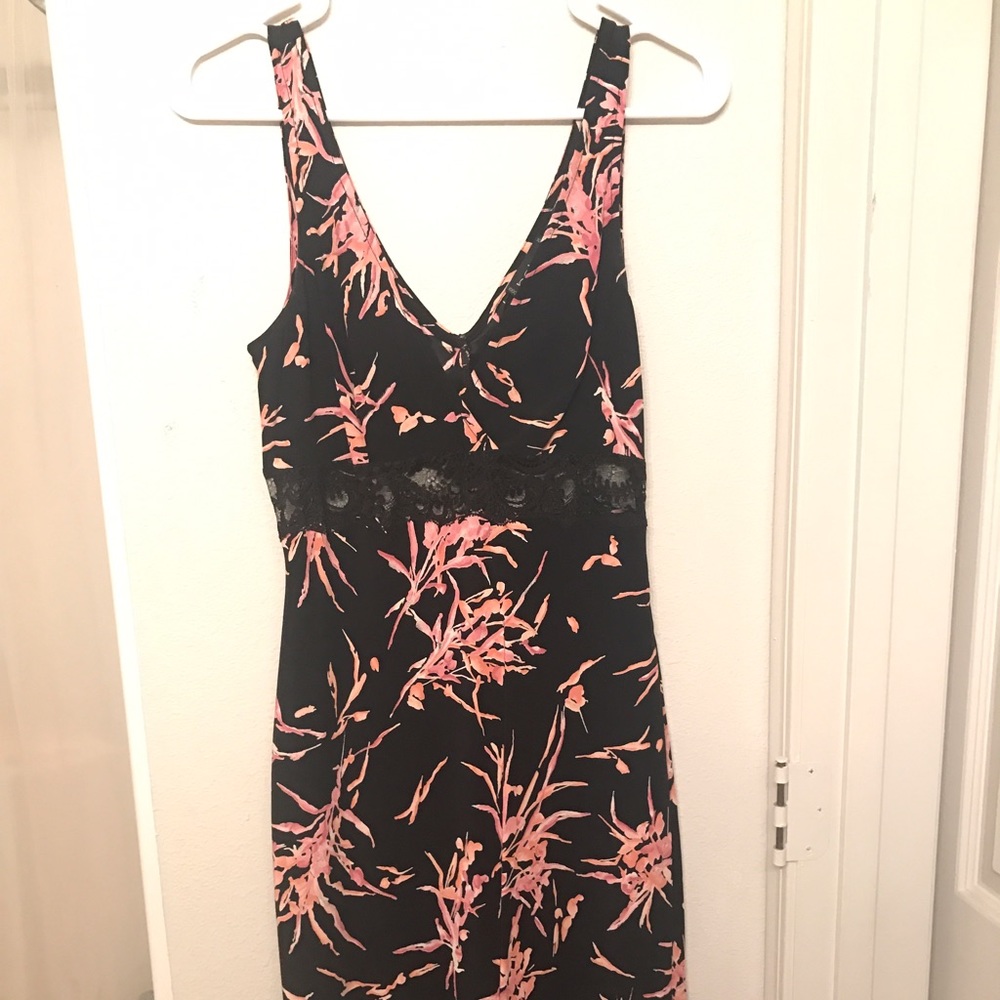 Bebe knee length black floral dress.