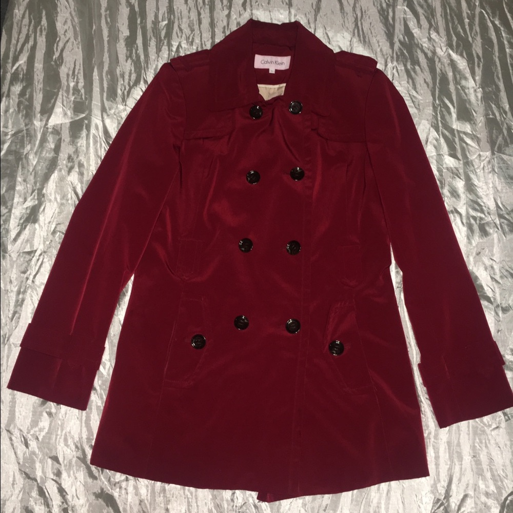 Red Calvin Klein trench coat
