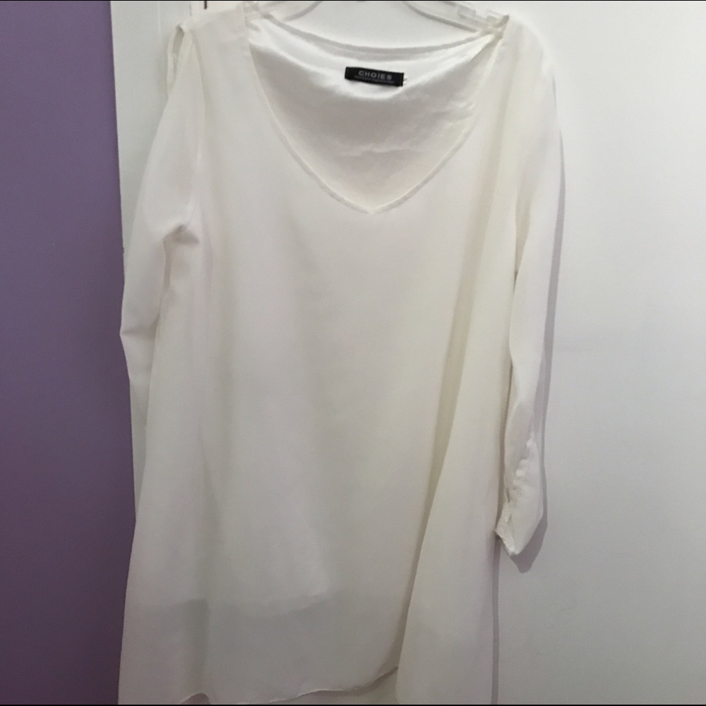 white dress with slits on sleeves