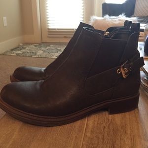 Dark brown ankle boots with gold zipper
