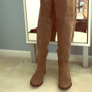 Brand new over the knee tan boots .