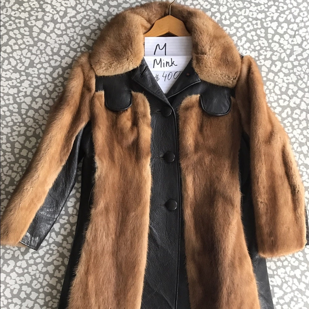 Mink and leather coat .