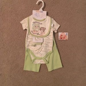 NWT. Bib, short sleeve and shorts onesie set.