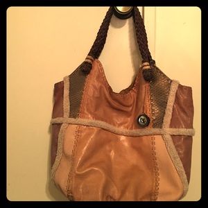 Tan patchwork purse, sturdy w/pockets.