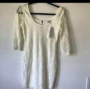 White lace dress NWOT never worn.