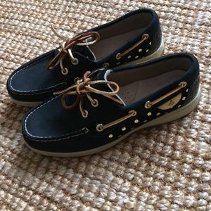 Black and gold Sperry Top Sider shoes