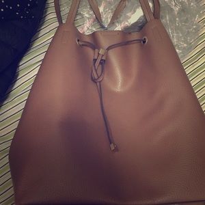Beautiful big bucket bag. Brownish color