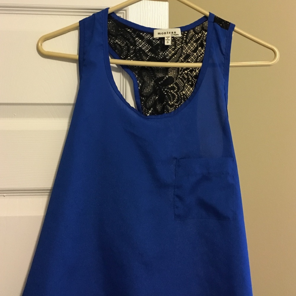 Blue tank style shirt with see through lace back.