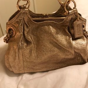 Rose gold coach bag