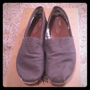 Gray TOMS slip ons