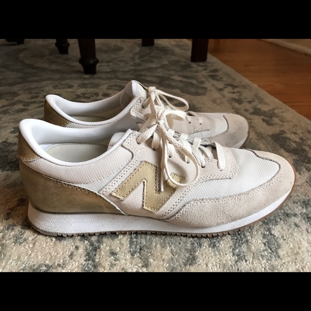 White and gold New Balance