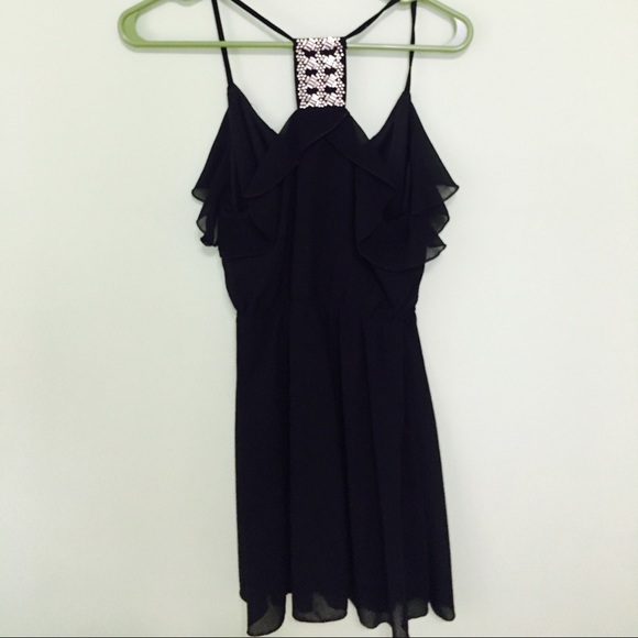 Little black dress with fun back detailing - Picture 1 of 3