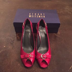 Patent red Stuart Weitzman peep-toe heels