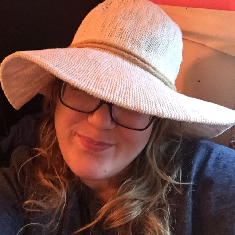 White floppy beach hat