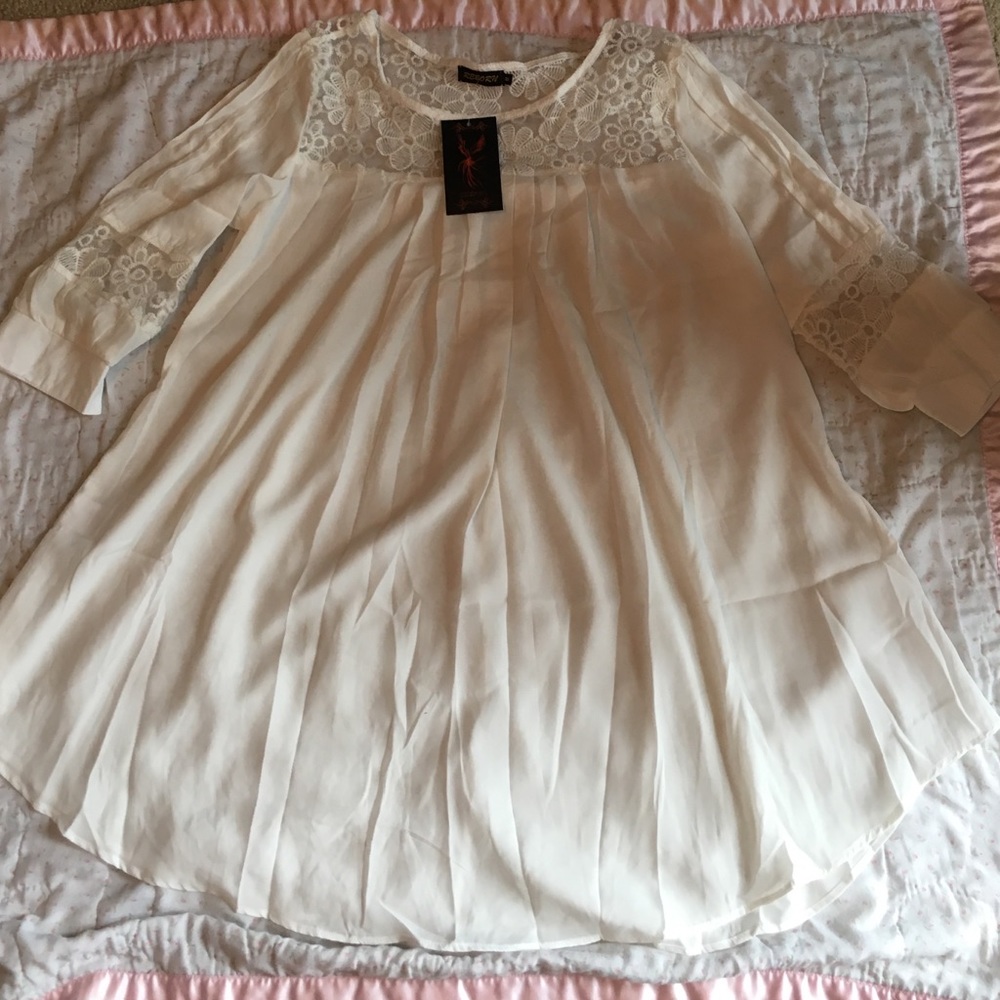 White knee-length top