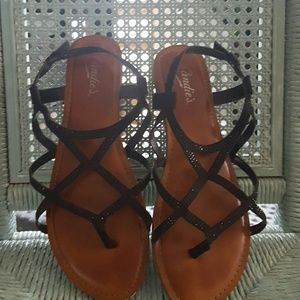 Flat black strappy sandals. Size 10