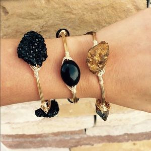 Set of 3 black and gold wire wrapped bangles.