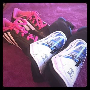 Girls soccer cleats and shin guards