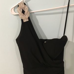 Single strap black gown.