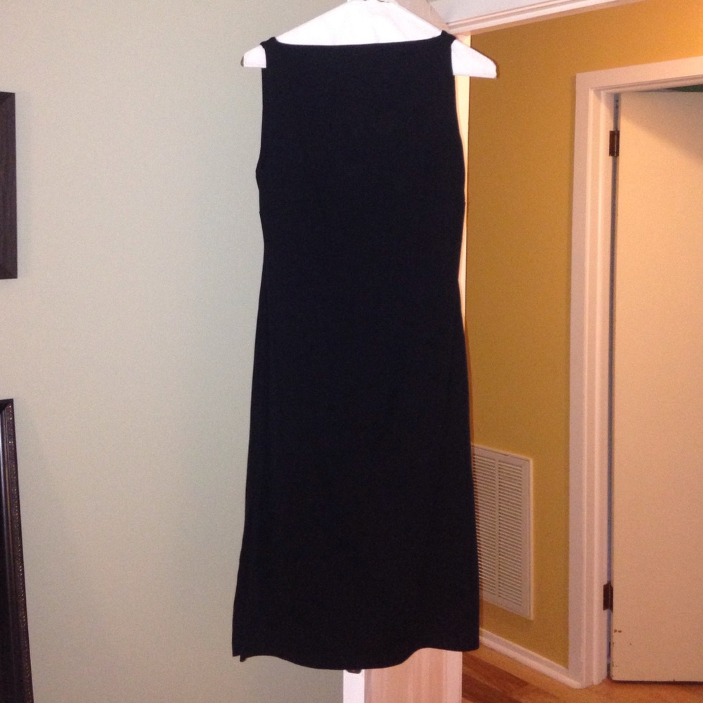 Black high-neck dress with thigh slits