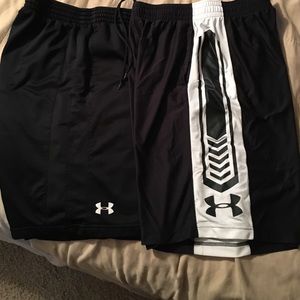 Two pair of Men's under armour shorts