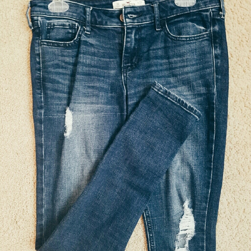 faded ripped blue jeans