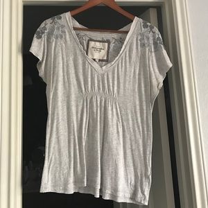 Casual babydoll top with embroidered detail