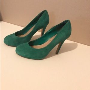 Green suede pumps