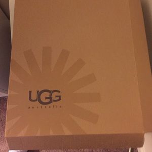 Tall black UGG's size 7.