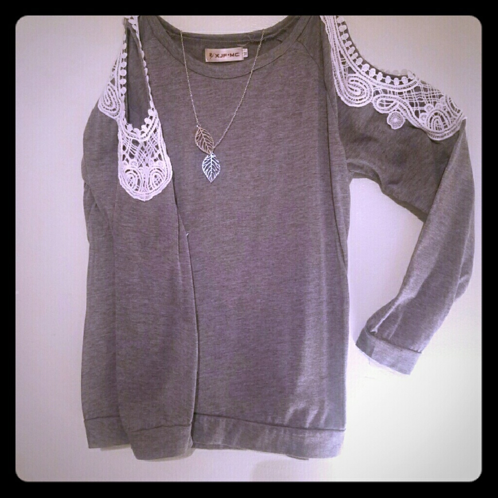 Long sleeve open shoulder/arm top