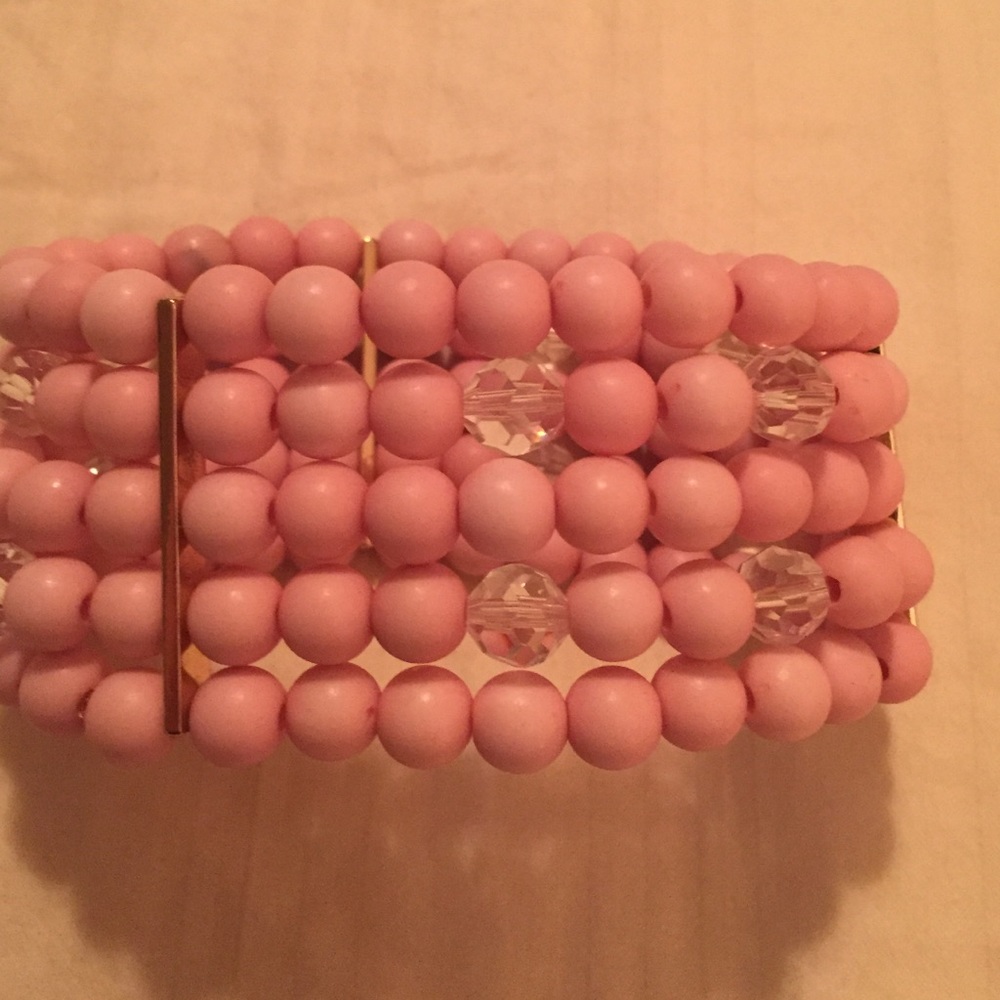 Charming Charlie Light pink stretchable bracelet ( never worn)