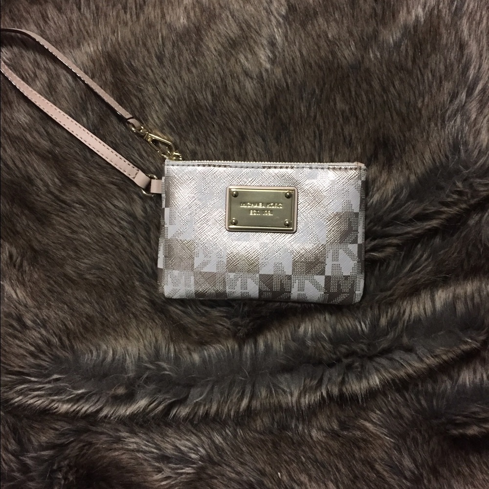 Michael Kors gold tone wristlet. NWOT.