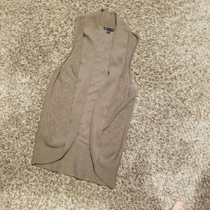 Sleeveless cardigan.