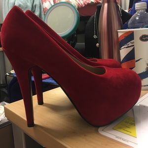 Red velour platform heels