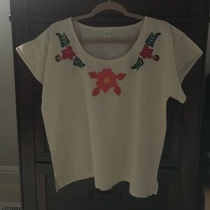 100% manta, embroidery done by hand.