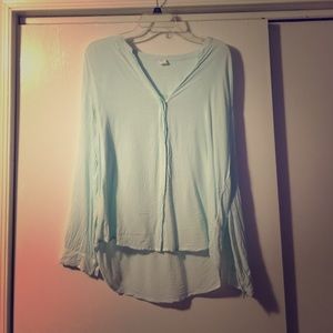 Light blue long sleeve button up dress shirt.